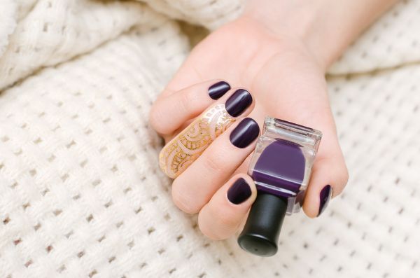 Dark purple nail polish